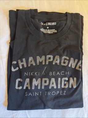 Nikki Beach Men's Short Sleeve Graphic Tee in Black - Champagne Campaign
